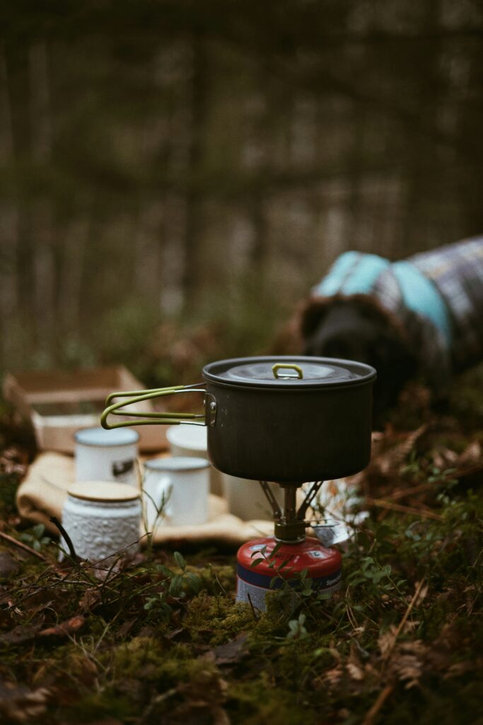 A compact stove, one of the essential camping tools for easy outdoor cooking.
