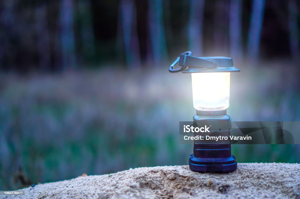 Reliable camping essentials like a waterproof flashlight for nighttime visibility.